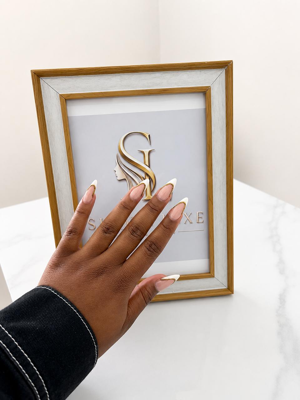 Silque Luxe gold French-tip nail art